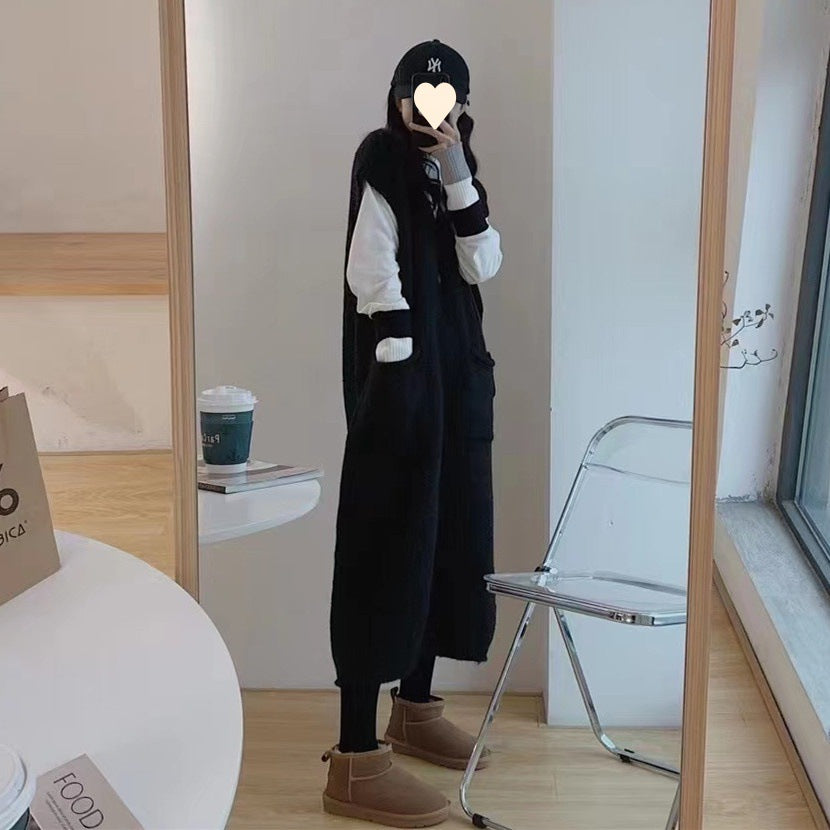 Petite Woman In A Vest Fur Coat And Skirt