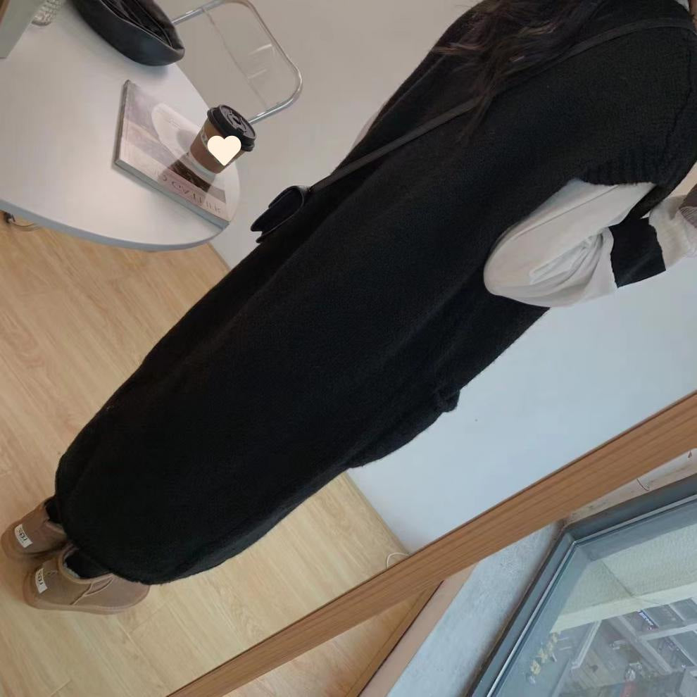 Petite Woman In A Vest Fur Coat And Skirt