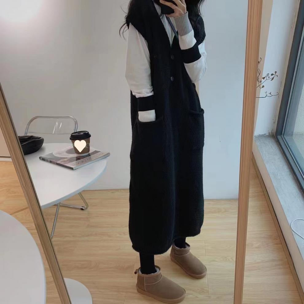 Petite Woman In A Vest Fur Coat And Skirt